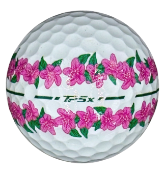 white taylormade tp5x golf ball with pink flower stripe
